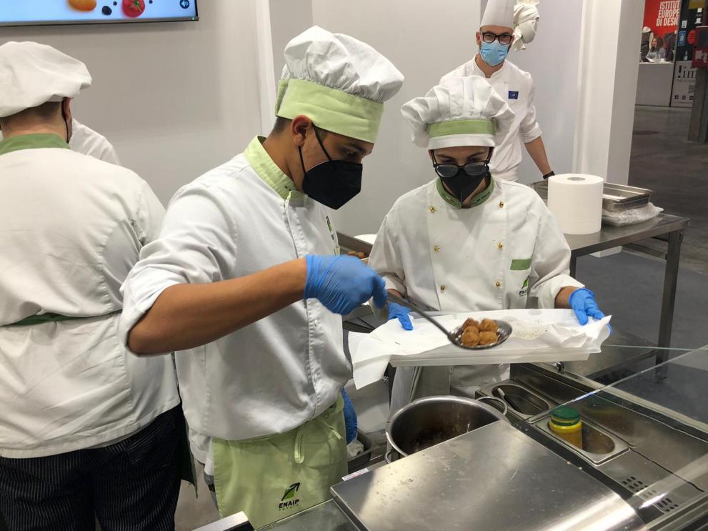Here you see students preparing food at the "Job&Orienta" Fair, the most important fair for the Education and Vocational training sector in Italy